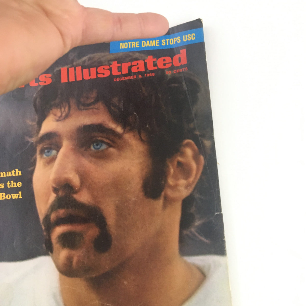 Cover of Sports Illustrated magazine from December 9, 1968, featuring Joe Namath, showcasing his iconic look as he eyes the Super Bowl.
