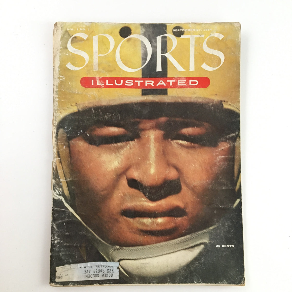Cover of Sports Illustrated Magazine September 27, 1954 showcasing Calvin Jones, Iowa Guard, with a focused expression.