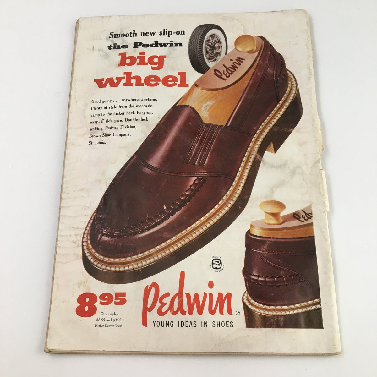 Vintage advertisement for Pedwin Big Wheel slip-on shoes, showcasing dark brown leather footwear with a stylish moccasin design. Highlights the price of $8.95. This ad reflects fashion trends of the era with the tagline 'young ideas in shoes'.