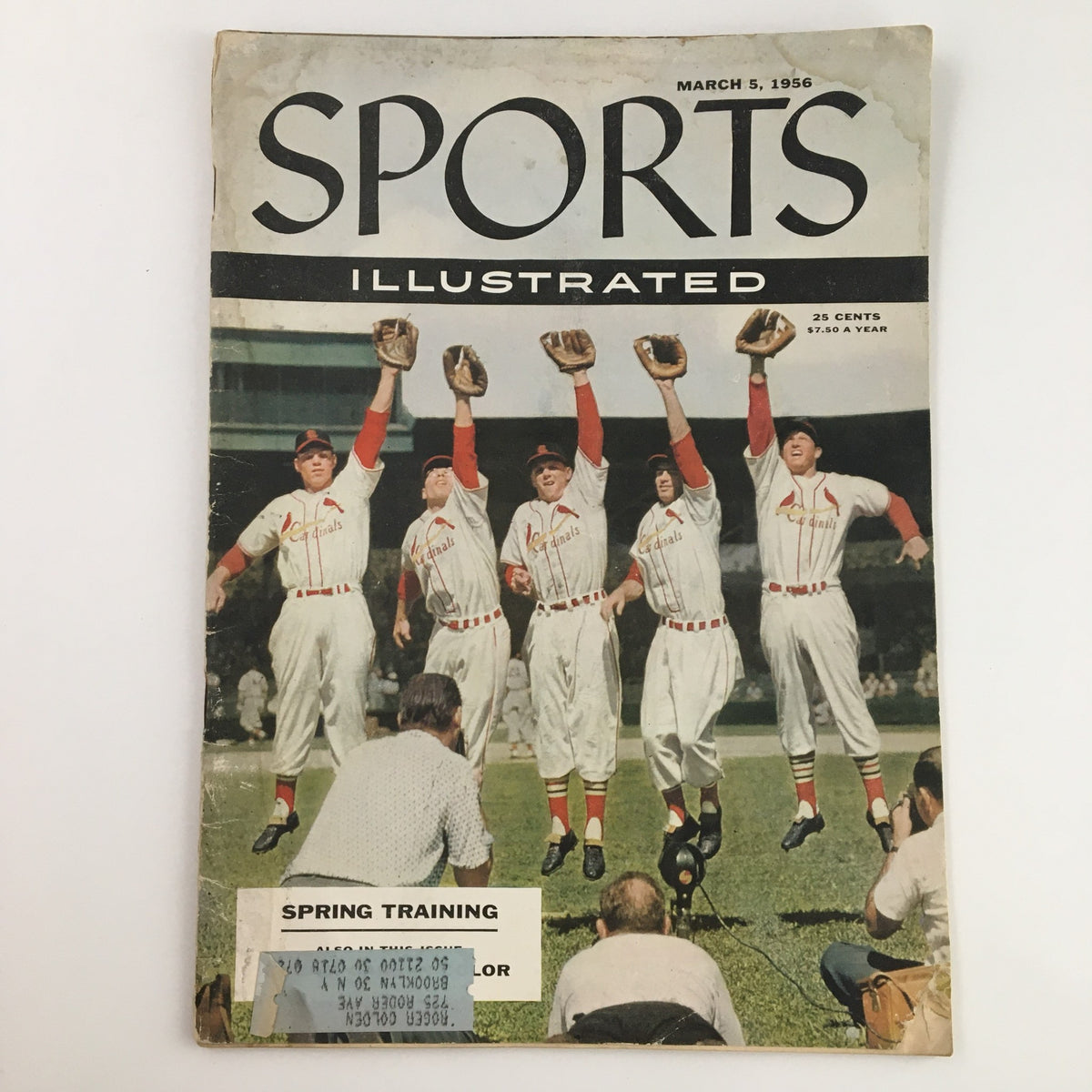 Cover of Sports Illustrated Magazine March 5, 1956 featuring Stan Musial of the St. Louis Cardinals. The cover showcases players in Cardinals uniforms during spring training.