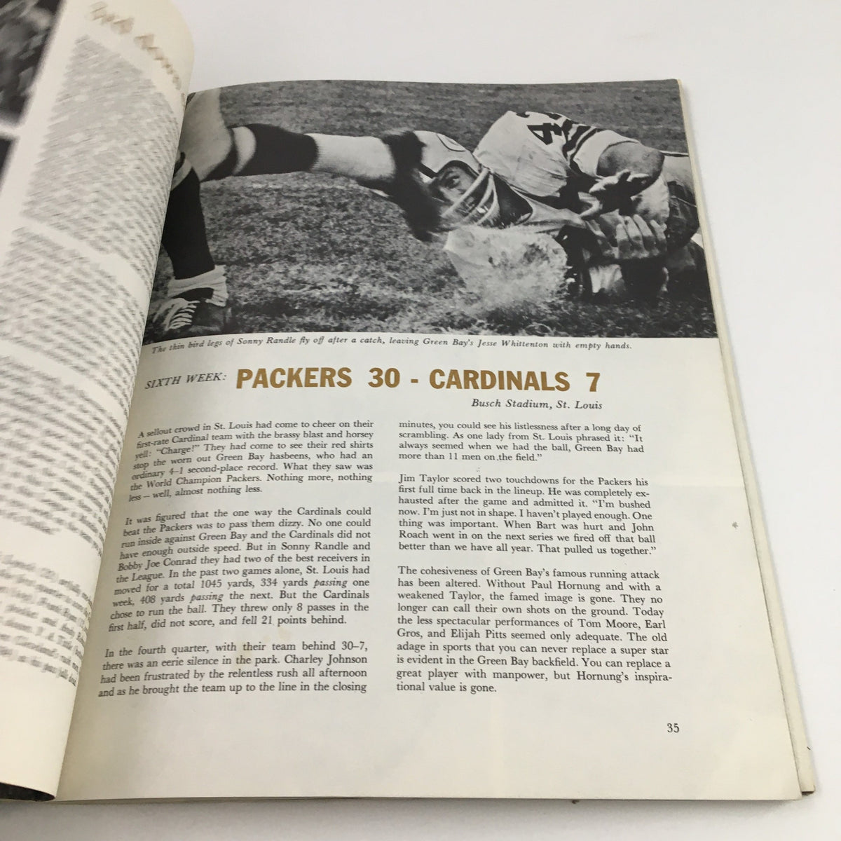 NFL Best Play of the Year 1963 Documentary - A black and white photo depicting a critical game moment with the Packers against the Cardinals.