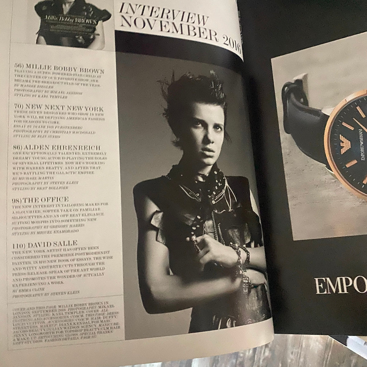 Interior page of Interview Magazine November 2016 featuring Millie Bobby Brown, highlighting her editorial and list of contributors in a chic layout.