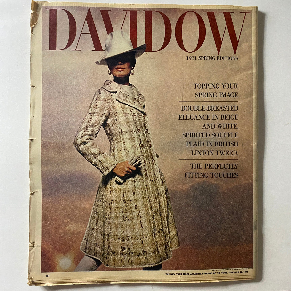 Cover of The New York Times Magazine February 28, 1971 featuring Fashions of Times Part 2, showcasing a model in a double-breasted beige and white coat, paired with a stylish hat, emphasizing spring fashion trends.