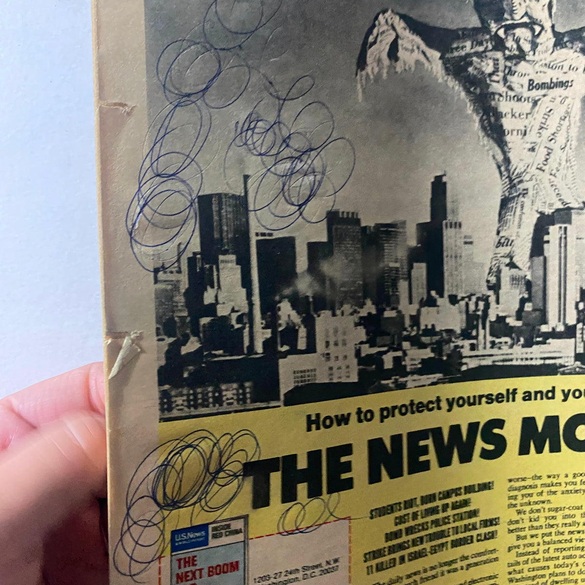 Close-up view of The New York Times Magazine February 21 1971 cover showing the graphic 'The News Monster' and city skyline, highlighting vintage details and handwritten markings.