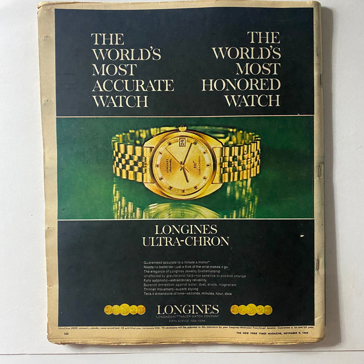 The back cover of The New York Times Magazine November 9, 1969, featuring an advertisement for Longines Ultra-Chron watch, highlighting its accuracy and reliability, alongside a visually appealing image of the timepiece.
