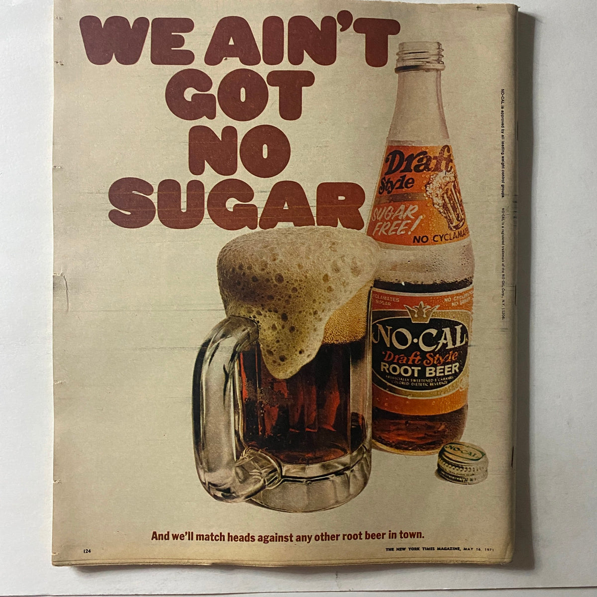 Advertisement from The New York Times Magazine dated May 16, 1971, promoting No-Cal Draft Style Root Beer with the slogan 'We Ain't Got No Sugar.' The image features a frothy mug of root beer next to a bottle, emphasizing its sugar-free quality.