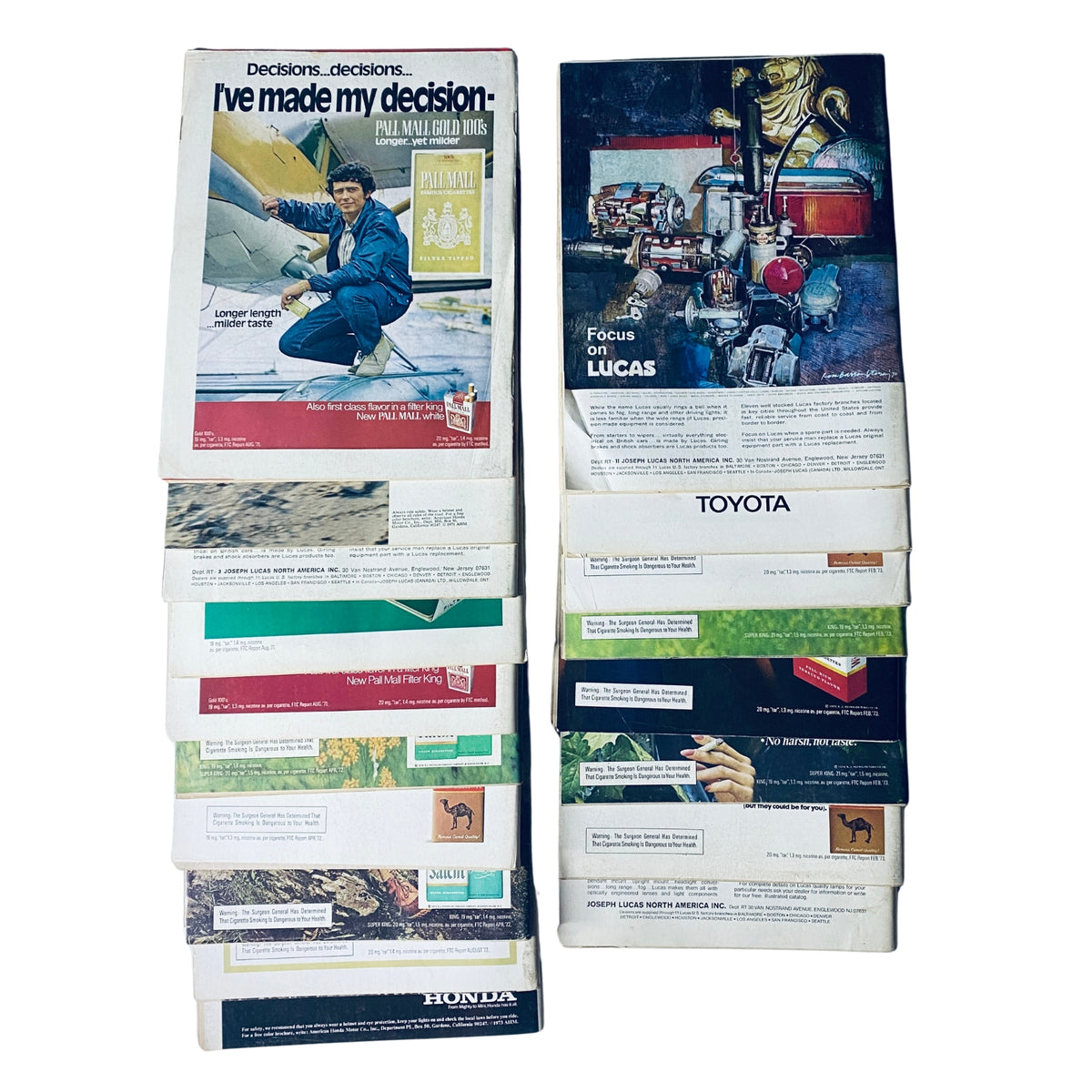 Lot of 18 Road & Track Magazines 1972–1973 featuring advertisements and articles related to automotive brands, displaying the magazine's back covers and marketing content.