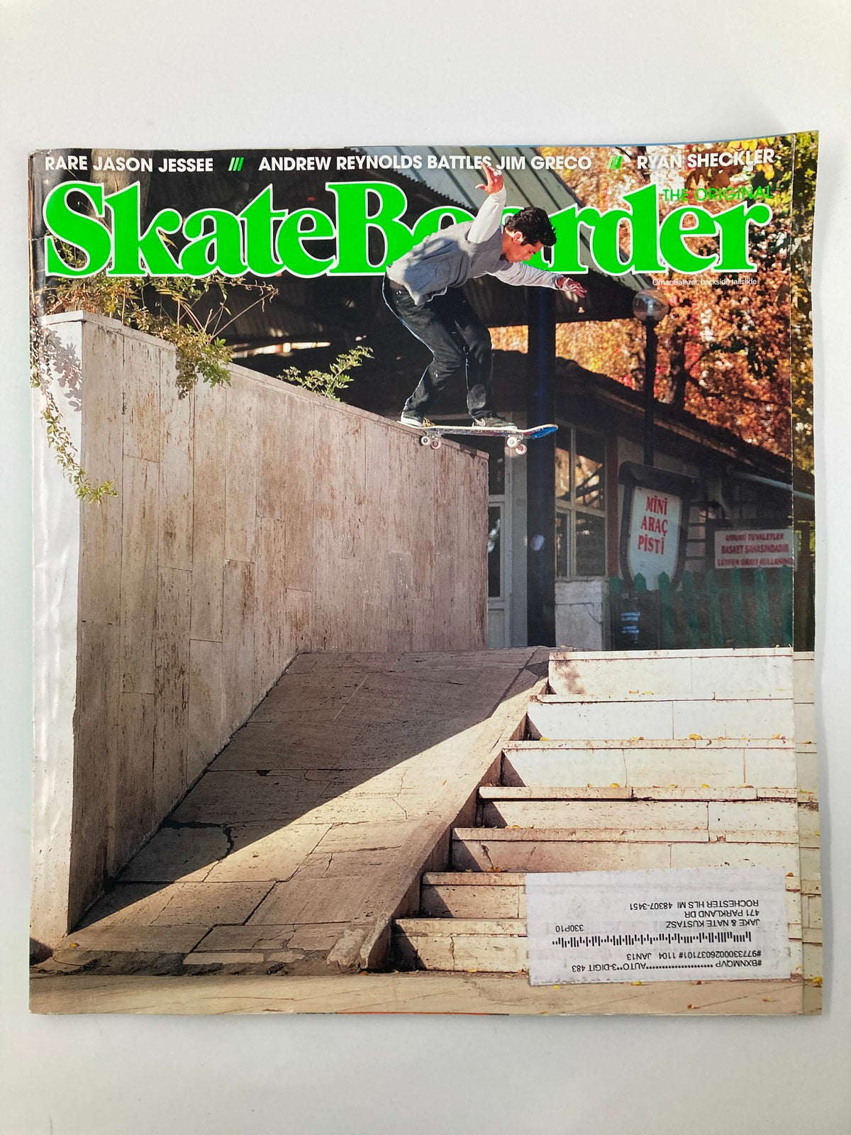 Skateboarder Magazine January 2013 featuring Omar Salazar performing a Backside Tailside on the cover, showcasing skateboarding culture and photography.