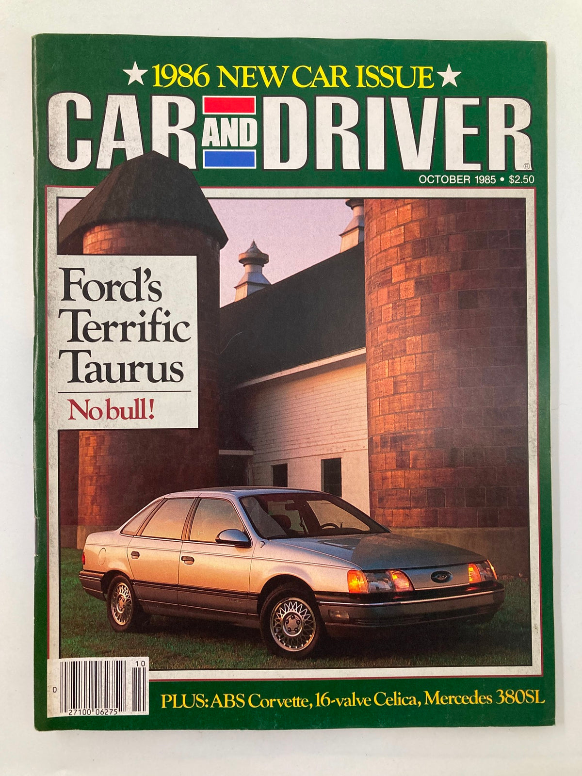 Cover of VTG Car and Driver Magazine October 1985 featuring Ford's Terrific Taurus with a silver sedan parked in front of a barn.
