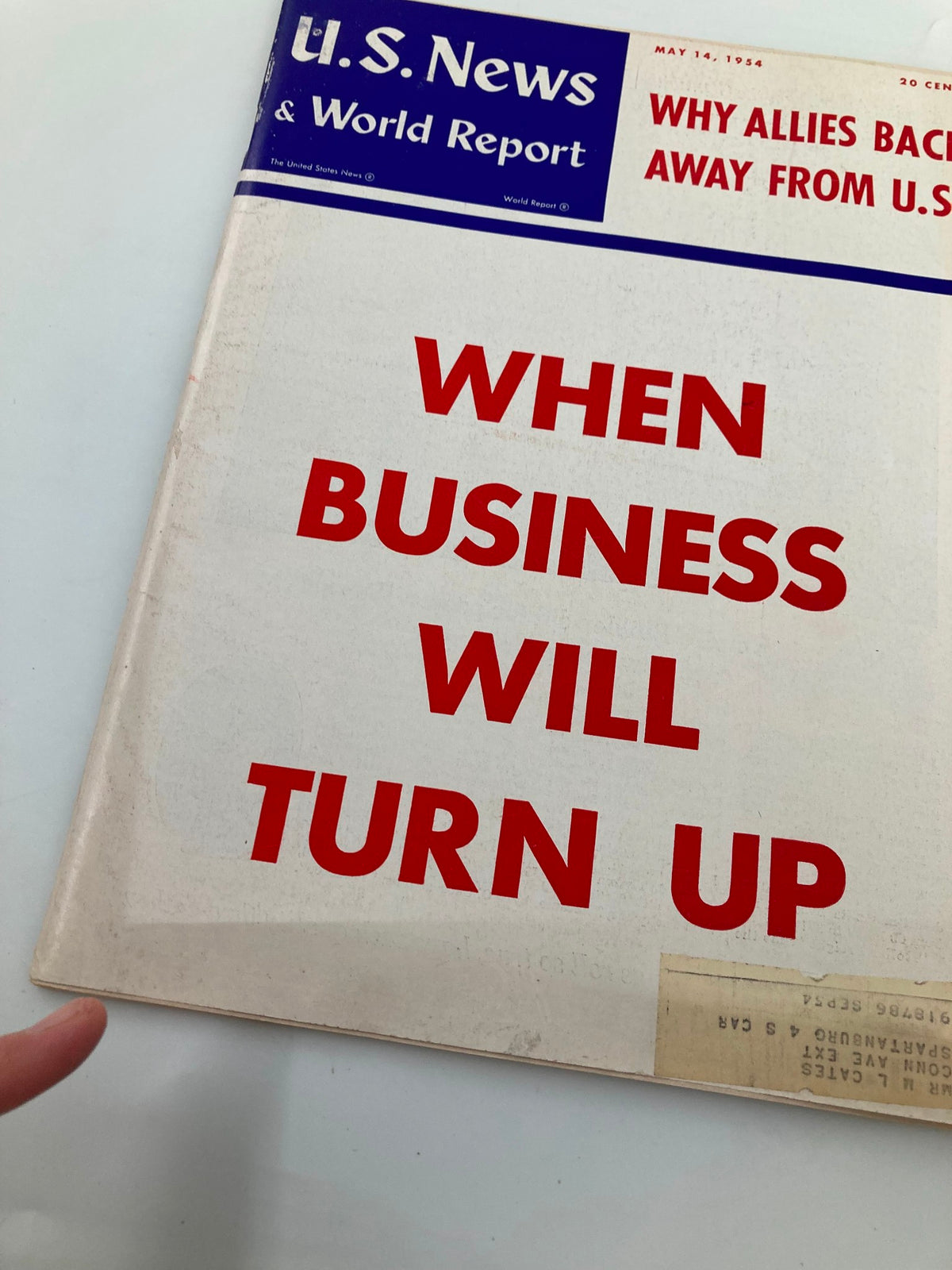 Close-up view of the US News & World Report Magazine cover from May 14, 1954, highlighting the title 'When Business Will Turn Up' in prominent red letters.