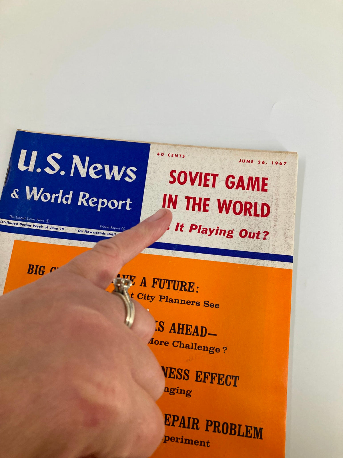 Close-up of US News & World Report Magazine June 26, 1967, cover showing the title 'Soviet Game in the World: Is It Playing Out?' along with additional topics like urban planning and population shifts.