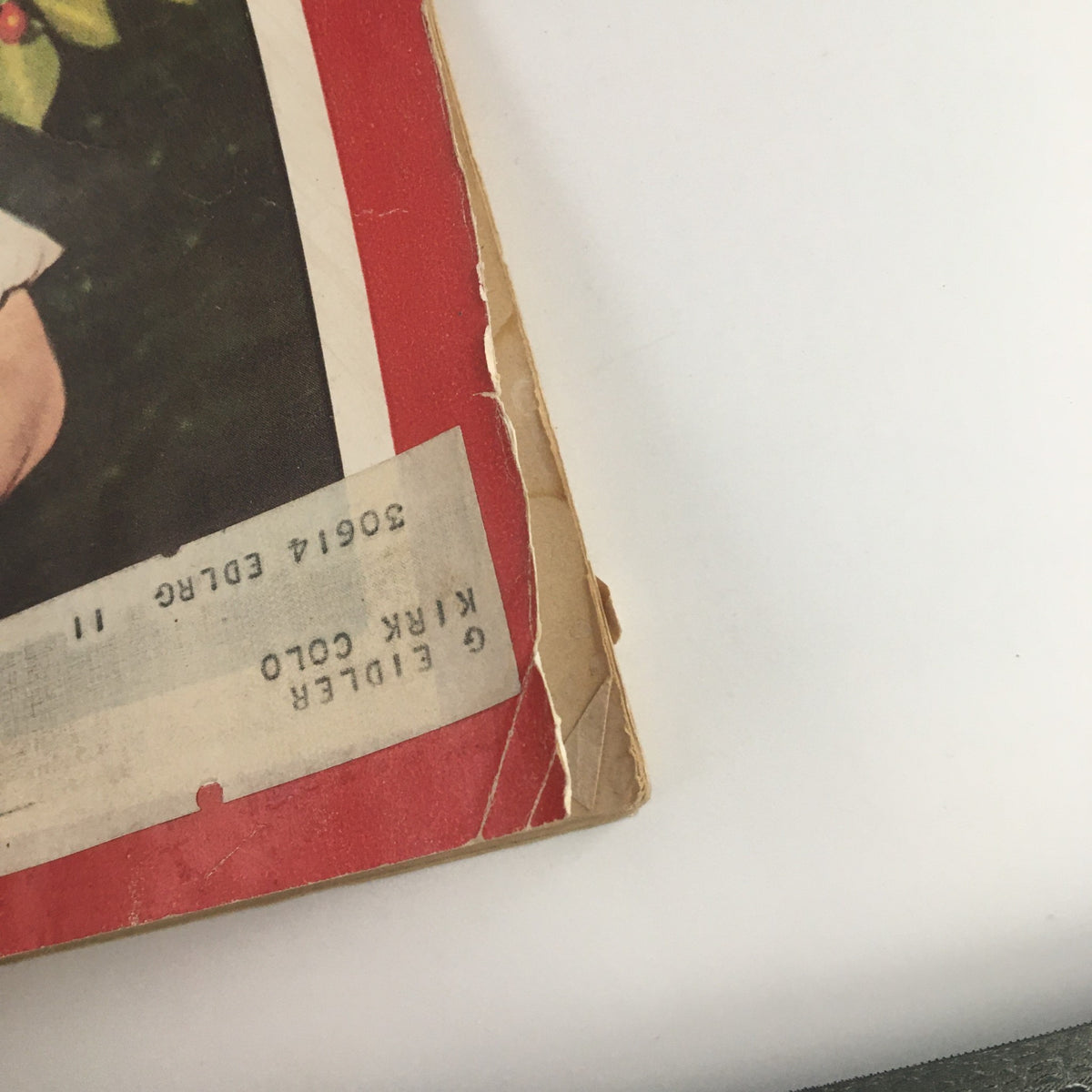 Close-up of the edge of the Newsweek Magazine July 5 1948 cover showing wear and the label details.