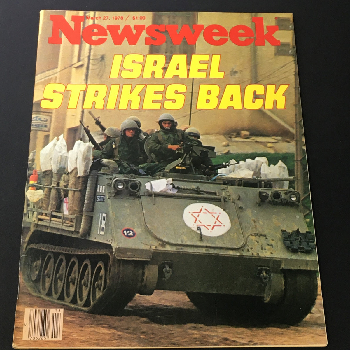 Cover of VTG Newsweek Magazine from March 27, 1978, featuring the title 'Israel Strikes Back' and showcasing military personnel on a vehicle, highlighting a pivotal moment in history.