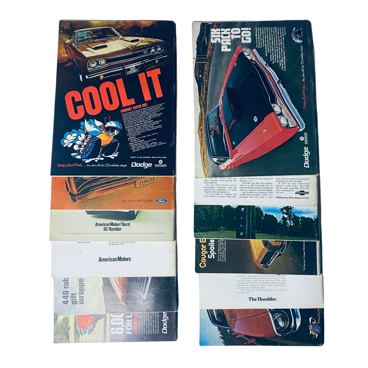 Back cover advertisements from 1969 Car and Driver magazines, featuring classic car promotions, including Dodge and American Motors.