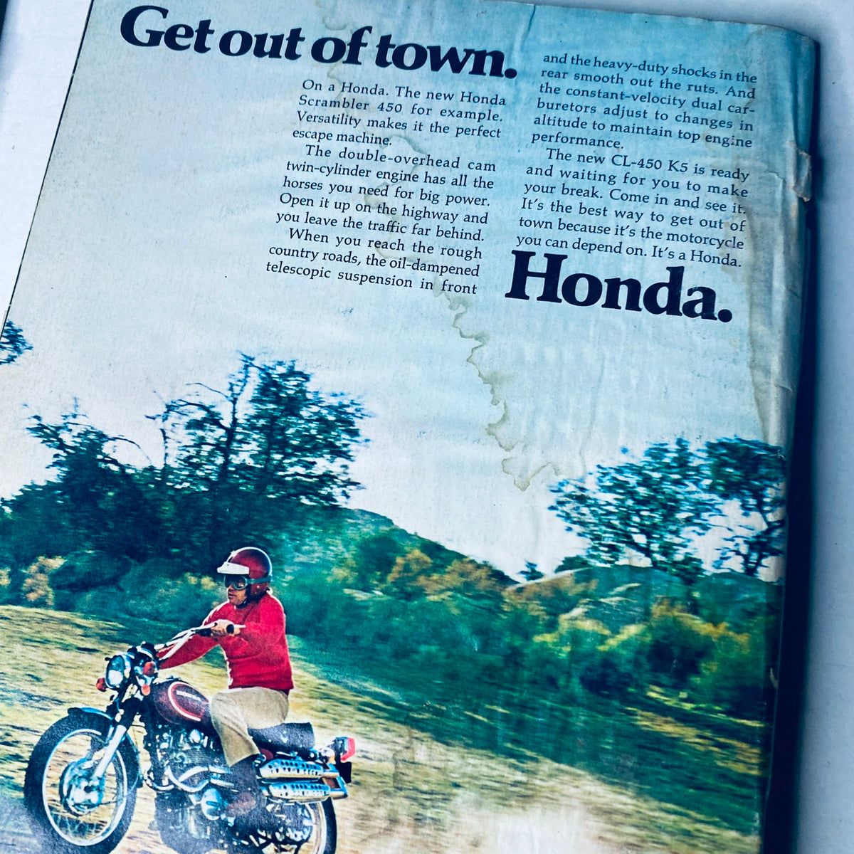 Lot of 11 Car and Driver Magazine 1972 January - September & December Set showcasing an advertisement for the Honda CL-450 motorcycle in outdoor setting.