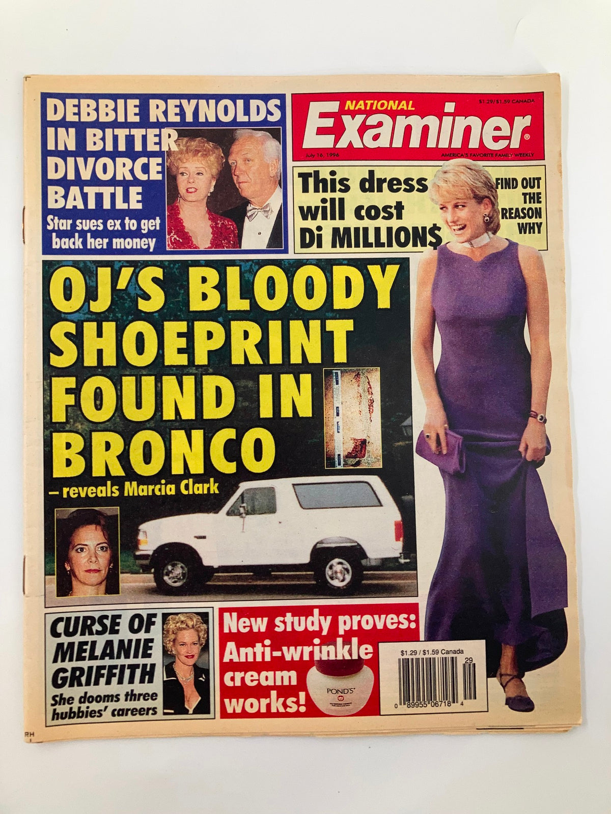Cover of the National Examiner Magazine from July 16, 1996, featuring Debbie Reynolds amidst her bitter divorce battle. The tabloid highlights prominent celebrity news including a story on O.J. Simpson's shoeprint linked to a Bronco, alongside other headlines.