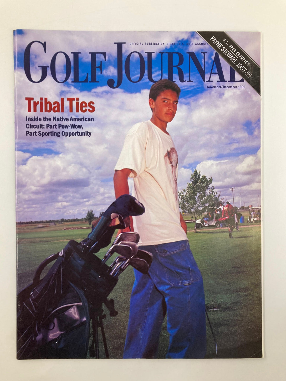 Cover of Golf Journal Magazine November 1999 featuring Mike Prue, the youth tournament winner, with a golf bag and clubs in the foreground.