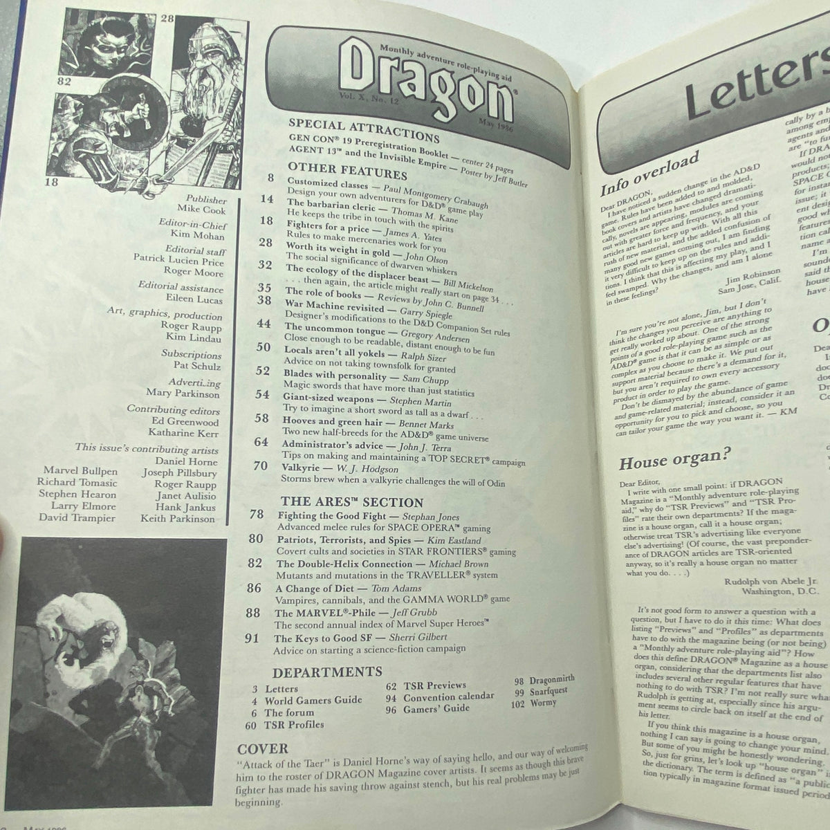 Interior spread of VTG Dragon Magazine May 1986 #109 featuring articles, illustrations, and gaming tips, highlighting the issue's content related to the Attack of The Taer.