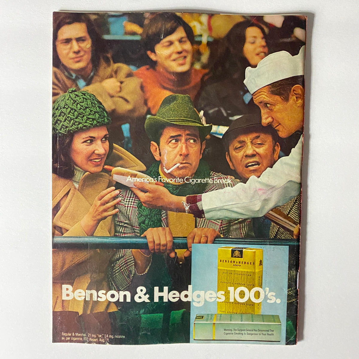 Vintage advertisement from the 1972 Time Magazine showing a group of people enjoying a cigarette break with Benson & Hedges branding.