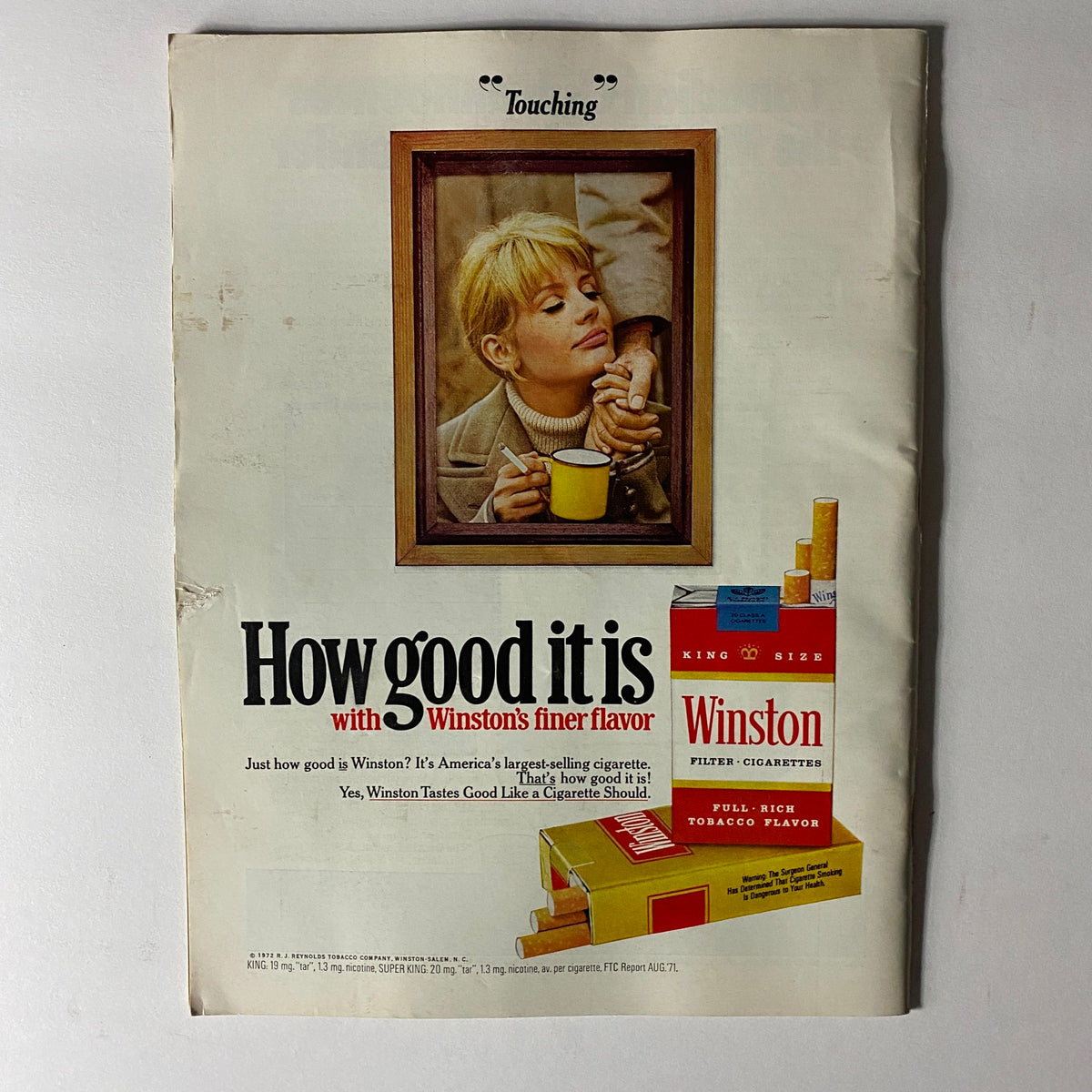 Vintage advertisement from VTG Time Magazine May 29, 1972 featuring Winston cigarettes. The ad displays a woman with a cigarette and a cup, emphasizing the slogan 'How good it is with Winston's finer flavor.' This piece captures the nostalgic appeal of 1970s advertising.