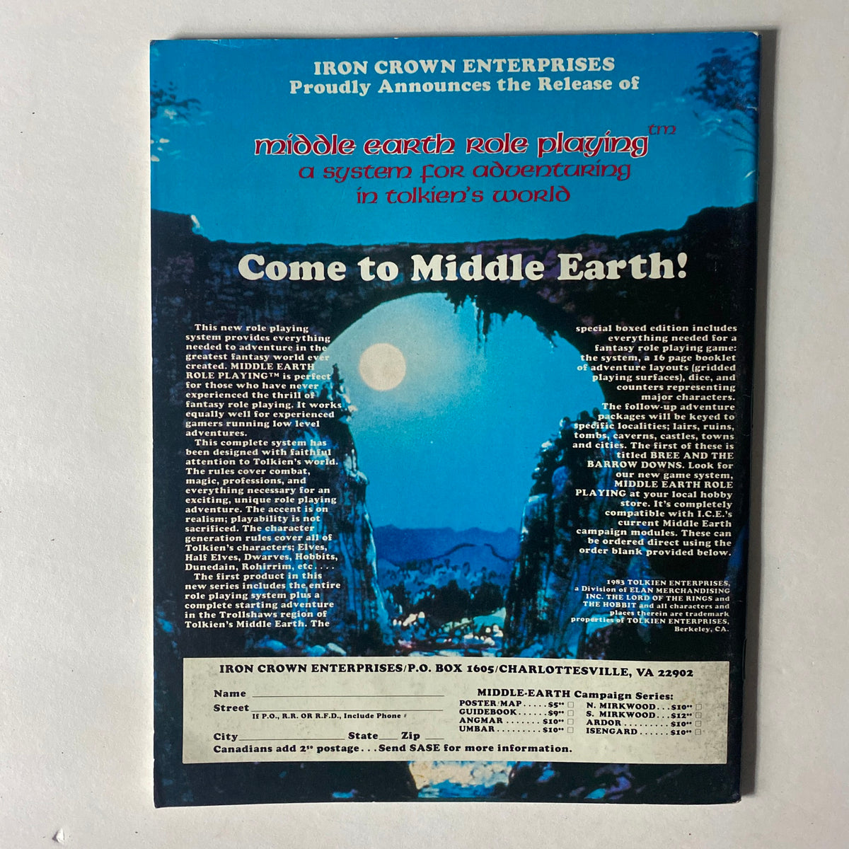 Back cover of VTG Dragon Magazine February 1984 #82 promoting Middle Earth role playing system, set against a scenic night landscape with a large moon, highlighting an adventure in Tolkien's world.