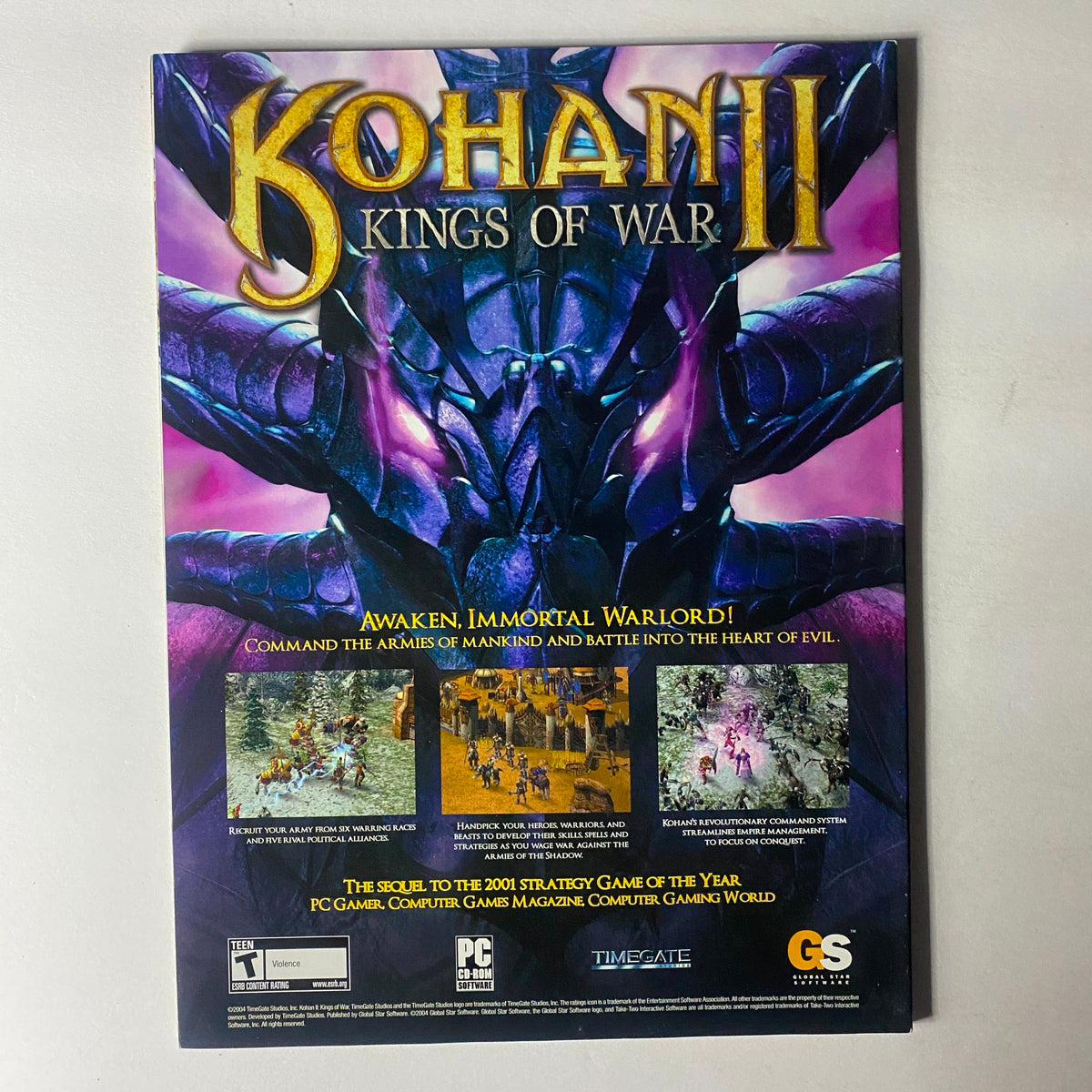 Back cover of Kohan II: Kings of War, a PC strategy game advertisement, featuring striking graphics and promotional details related to the gameplay and its connection to the 2001 Game of the Year.