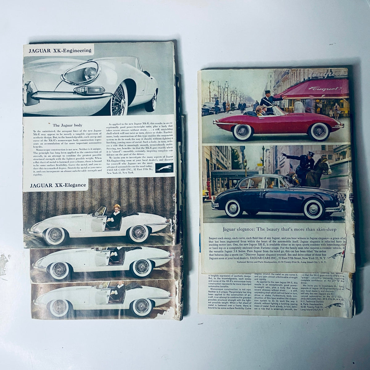 Inside view of Lot of 5 Road & Track The Motor Enthusiasts' Magazine highlighting Jaguar XK models from 1962 with detailed engineering texts and elegant car photography, providing a glimpse into automotive history.