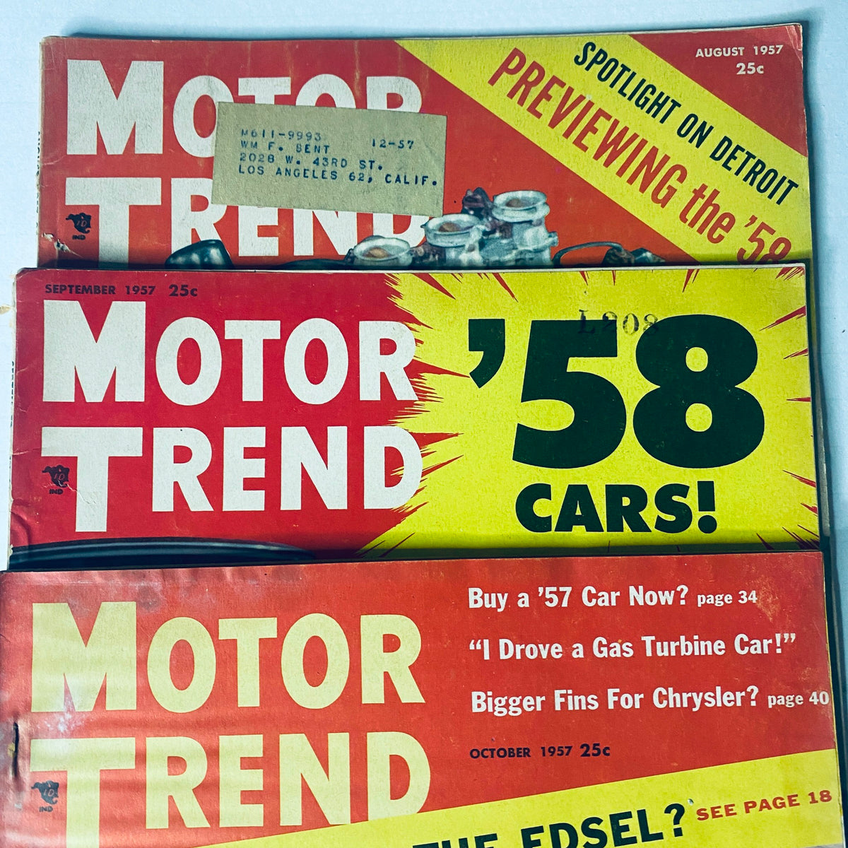 Motor Trend Magazine September and October 1957 issues emphasizing upcoming car models and automotive trends.