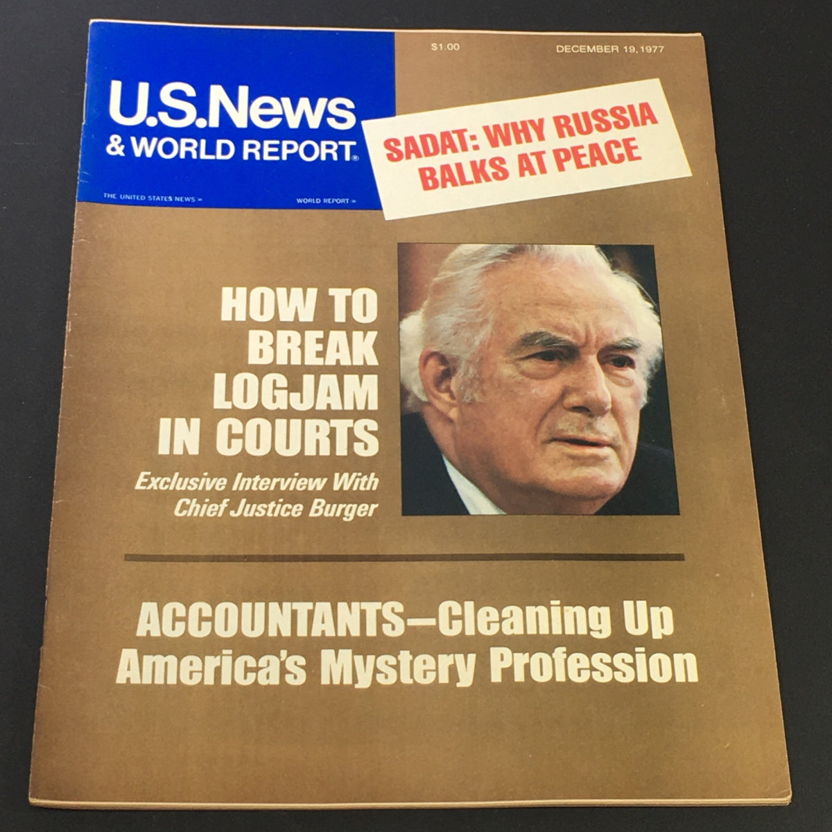 Vintage U.S. News & World Report cover from December 7, 1977, featuring Chief Justice Warren E. Burger. The cover highlights an exclusive interview and includes articles on legal topics and other news of the time.