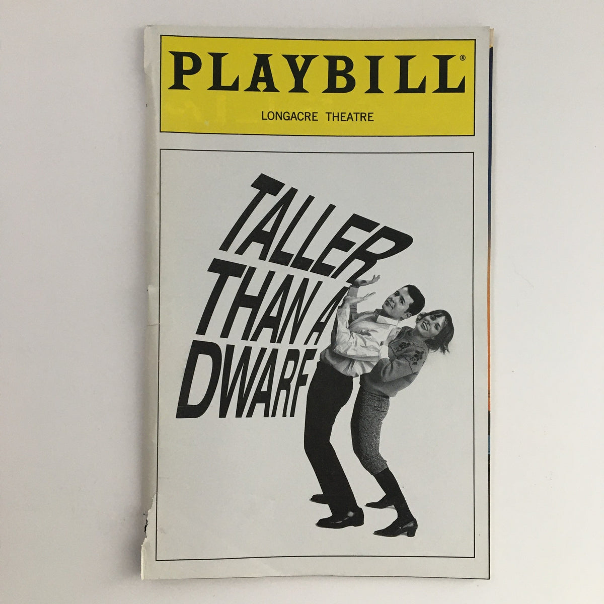 2000 Playbill for Taller Than A Dwarf by Elaine May featuring a black and white cover design with the title prominently displayed.