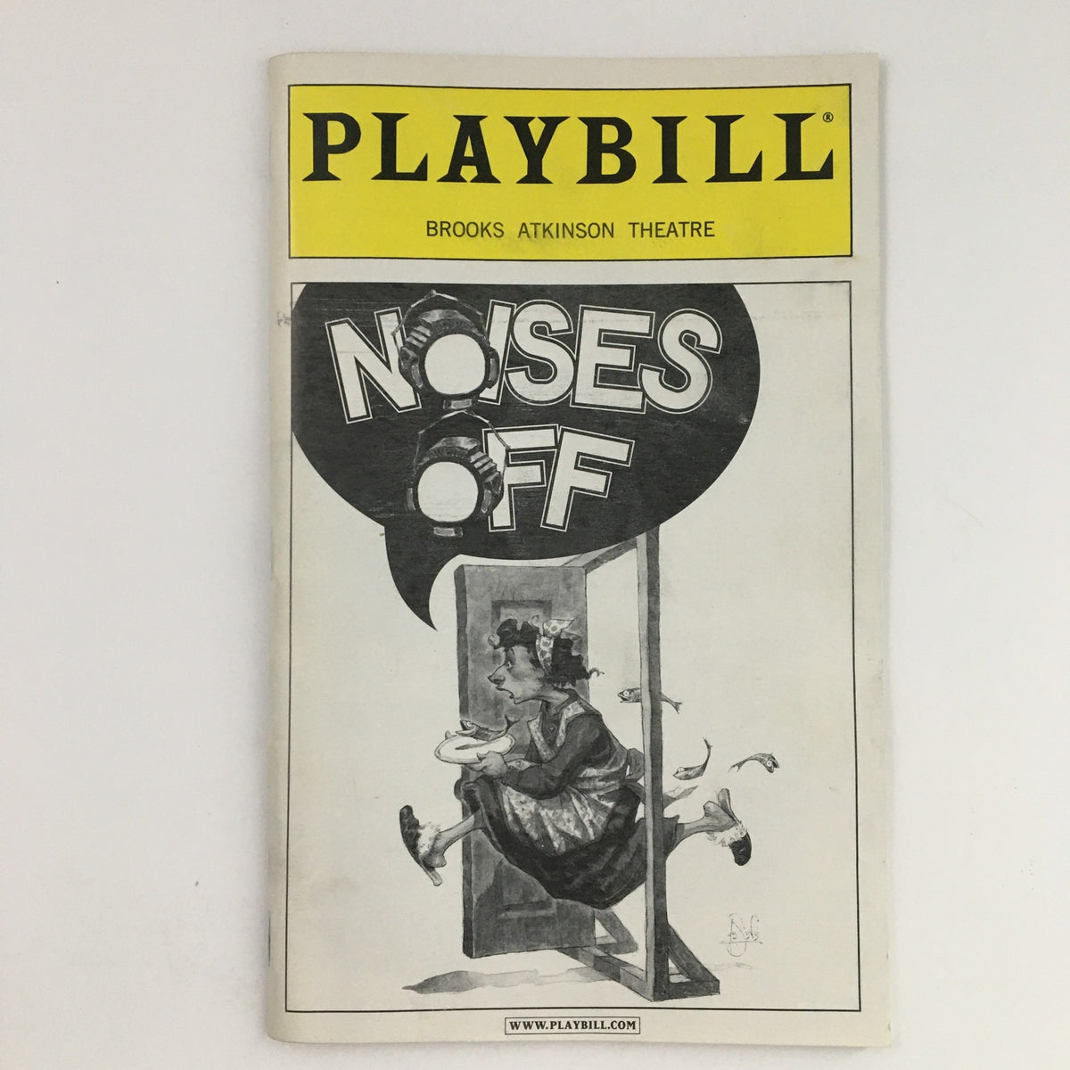 2001 Playbill featuring Noises Off at the Brooks Atkinson Theatre with artwork depicting a character in a comedic pose.