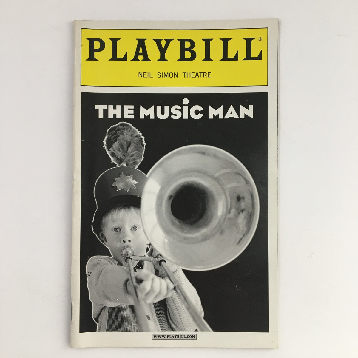 2000 Playbill for The Music Man from Neil Simon Theatre featuring cover image of a young boy holding a trumpet.