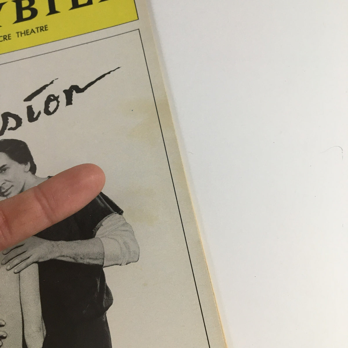 Close-up view of the 1983 Playbill 'Passion' showing Frank Langella and a female actor, focusing on the cover details.