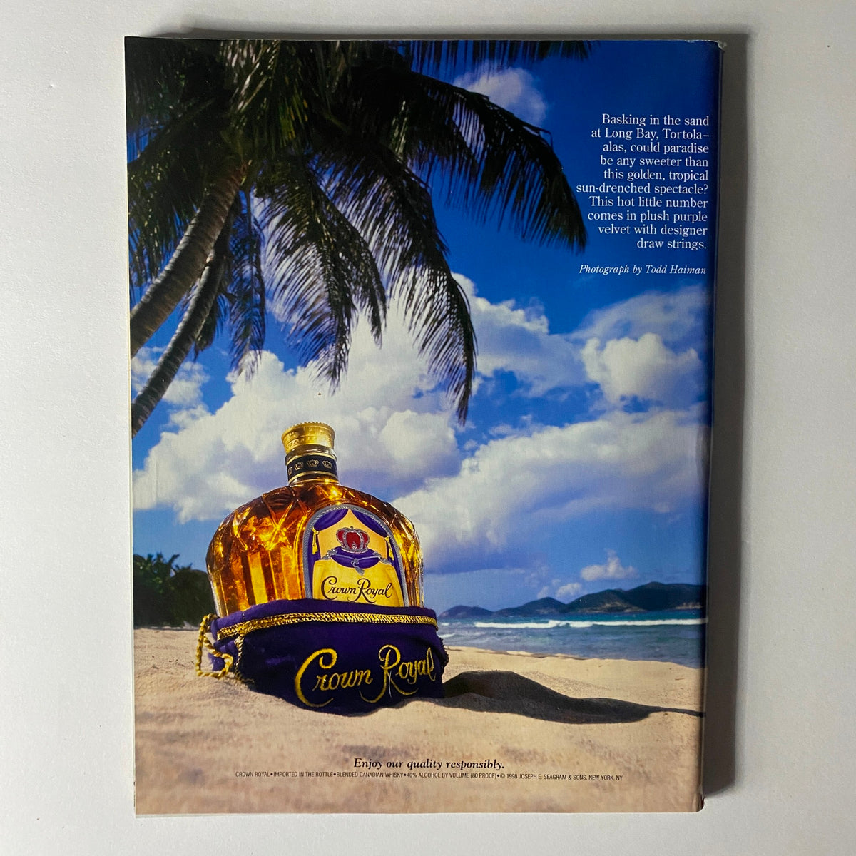 Back cover of Sports Illustrated Magazine Winter 1999, showcasing a Crown Royal advertisement on a tropical beach with palm trees.