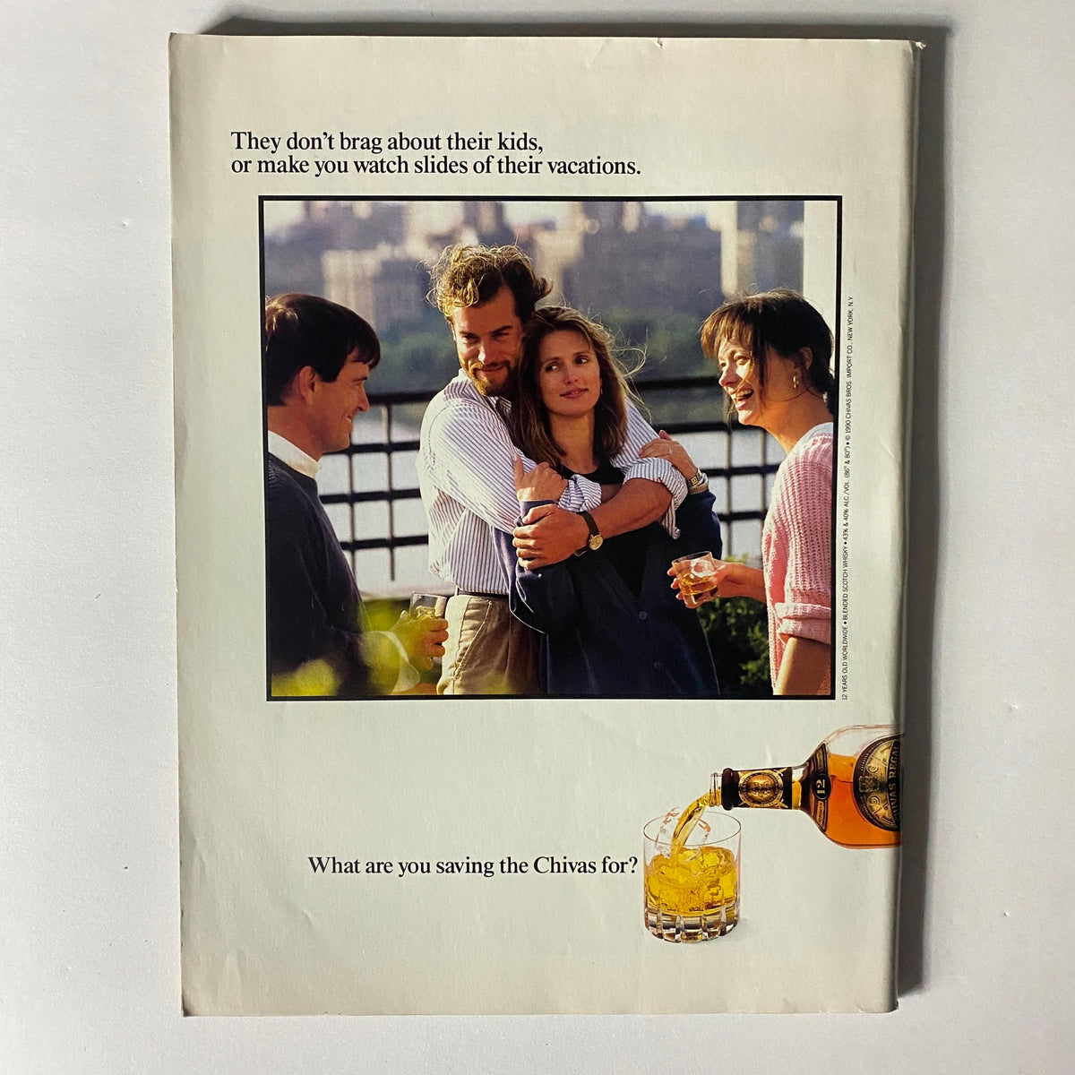 Back cover of Sports Illustrated Magazine February 11, 1991 displaying a group of friends enjoying drinks with a text that reads, 'What are you saving the Chivas for?'