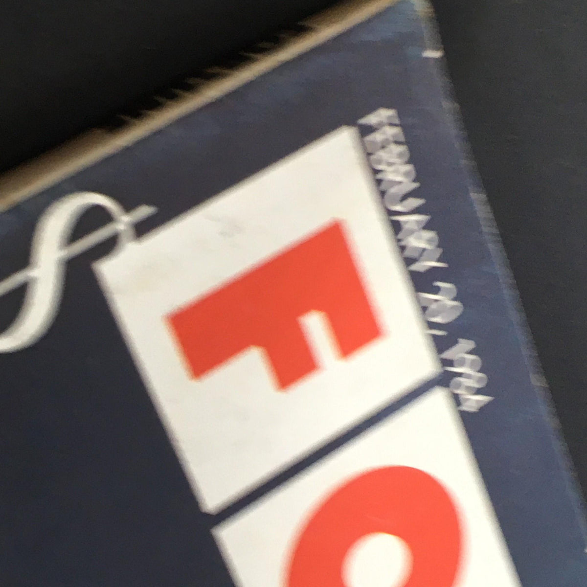 Side view of the Fortune Magazine cover dated February 20, 1984, displaying the magazine title and publication date with noticeable wear, reflecting its vintage condition.