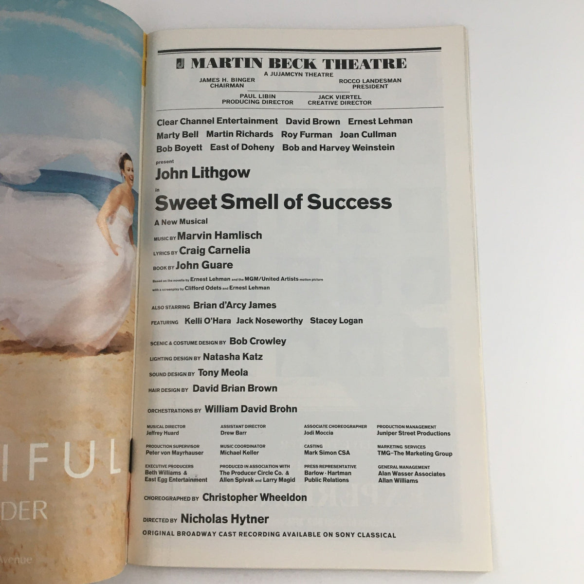 Page from the 2002 Playbill for Sweet Smell of Success, displaying cast members and production details at the Martin Beck Theatre.