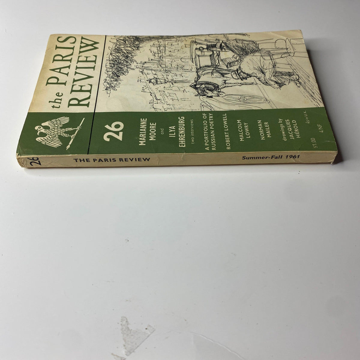 The Paris Review Magazine Summer-Fall 1961 No. 26 featuring Marianne Moore on the cover, highlighting the number 26 and showcasing an illustration.