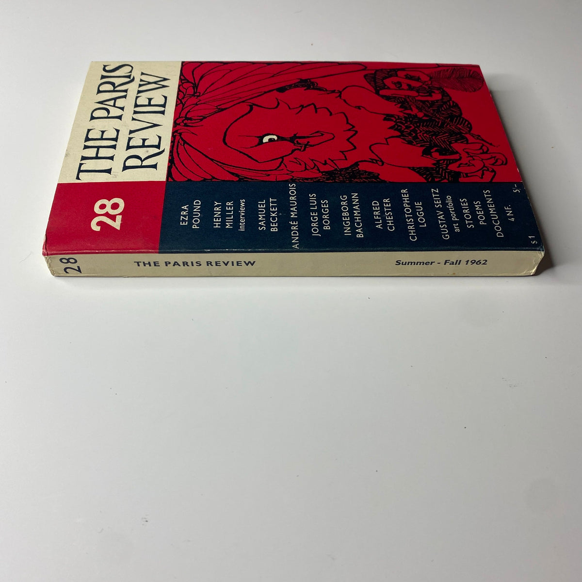 Side view of The Paris Review Magazine, Summer-Fall 1962, No. 28 showcasing the magazine's spine and the distinct cover design highlighting key authors.