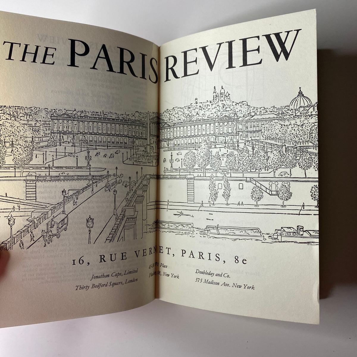 Inside view of The Paris Review Magazine, Summer-Fall 1962, featuring a detailed illustration of Paris. Issue No. 28 highlights Ezra Pound with no label, in very good condition.