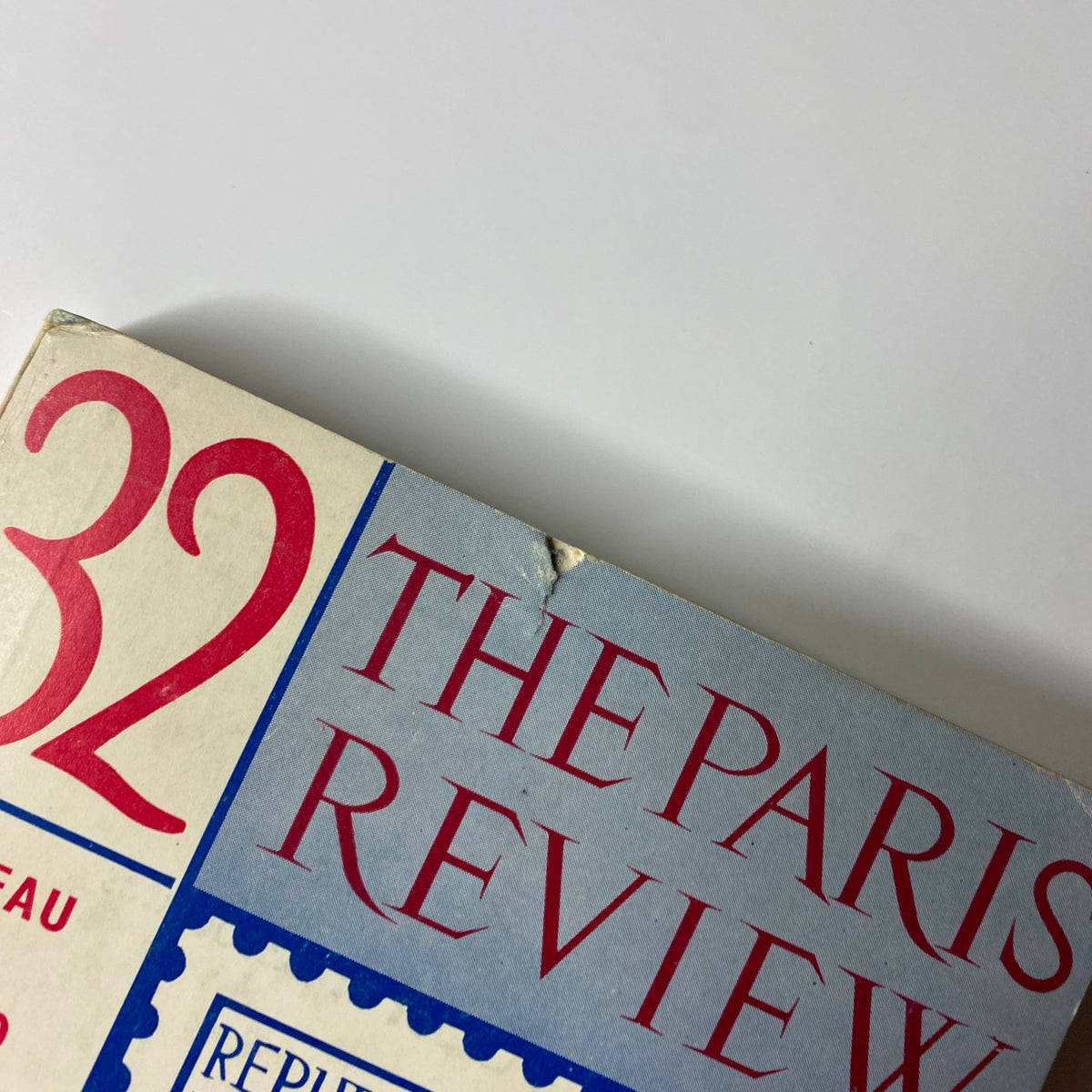 Edge detail of The Paris Review Magazine Summer-Fall 1964 No. 32 showing minor wear on the cover.
