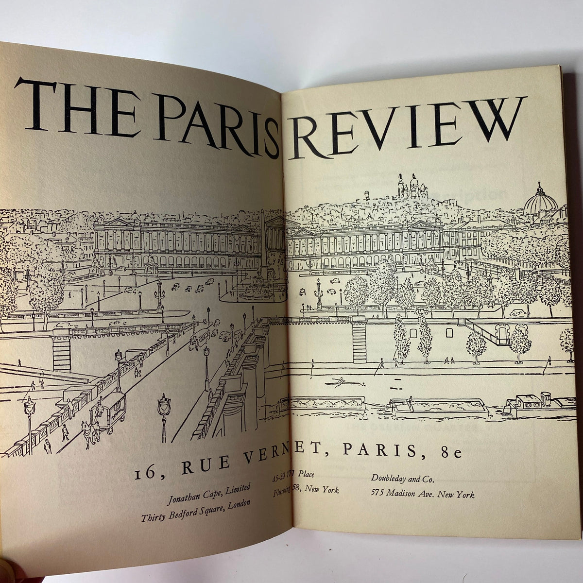 Inside view of The Paris Review Magazine Winter-Spring 1965 No. 33, displaying the title page with an illustration of Paris landmarks, emphasizing the magazine's cultural significance.