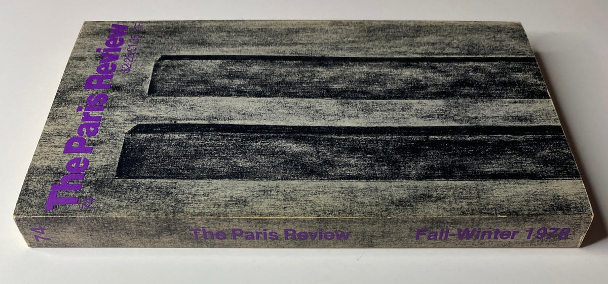 Spine view of The Paris Review Magazine Fall-Winter 1978 No. 74 showcasing the issue number and publication details in purple font.