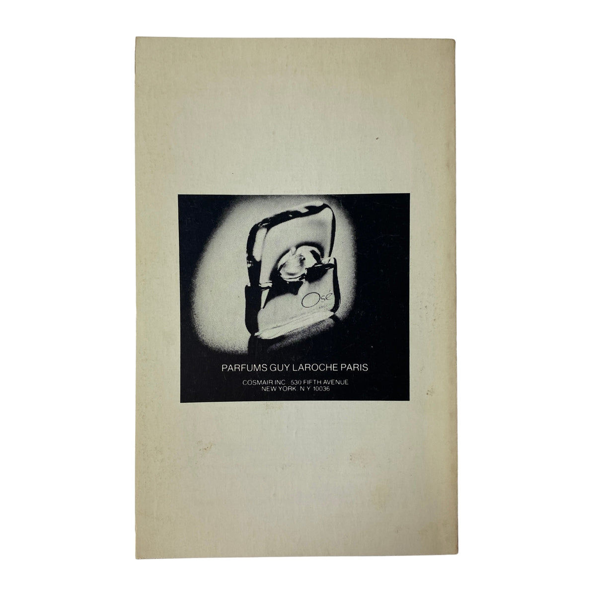 Back cover of The Paris Review Magazine Fall-Winter 1978 No. 74 displaying an advertisement for Parfums Guy Laroche Paris, featuring a distinct image design.