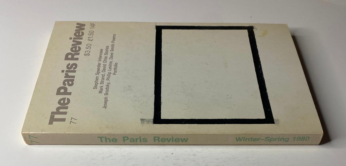 Side view of The Paris Review Magazine Winter-Spring 1980 No. 77 showcasing its spine with the title and issue number, emphasizing its collection of fiction, poetry, and interviews.