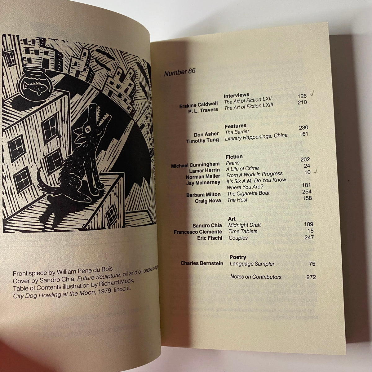 The Paris Review Magazine Spring 1982 No. 86 cover featuring an illustration of a dog howling at the moon, with poetry and fiction listings, including Erskine Caldwell and P. L. Travers interviews.