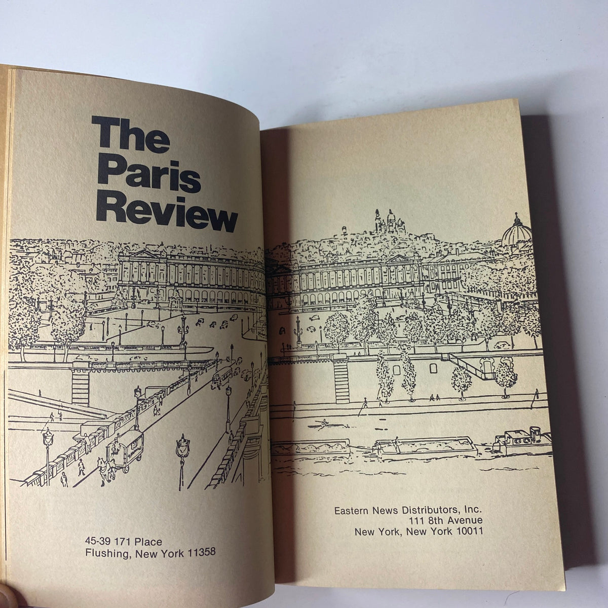 Inside view of The Paris Review Magazine Fall 1984 No. 93 Julio Cortázar, featuring a line drawing of a scenic view and details of the distributor.