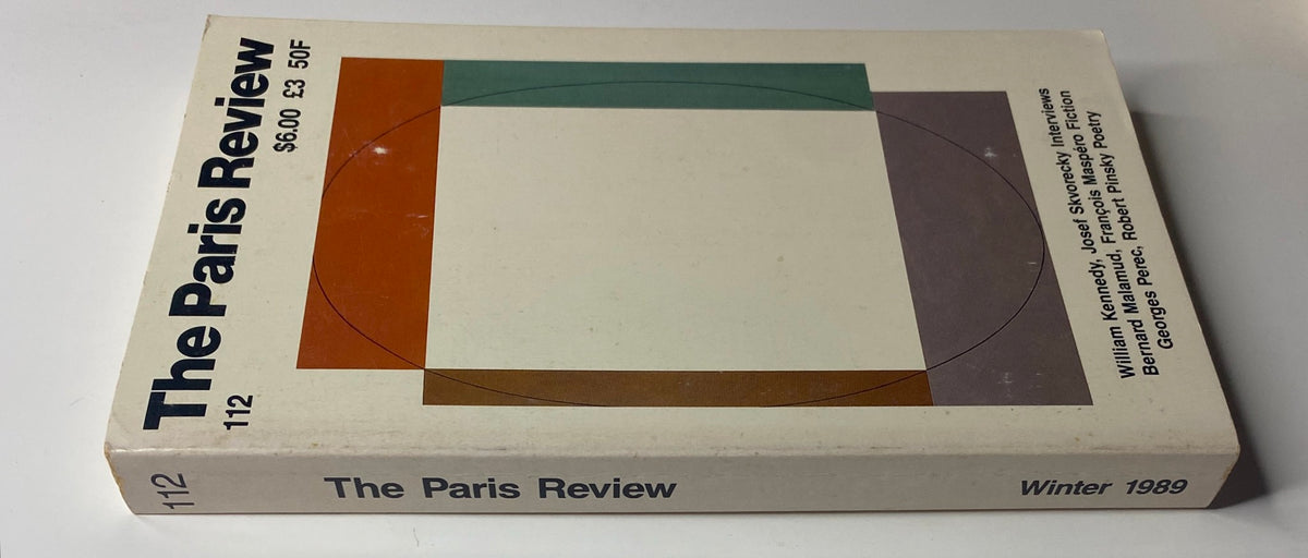 Spine view of The Paris Review Magazine Winter 1989 No. 112 showcasing its title and highlights including Bernard Malamud and Robert Pinsky in a clean layout.