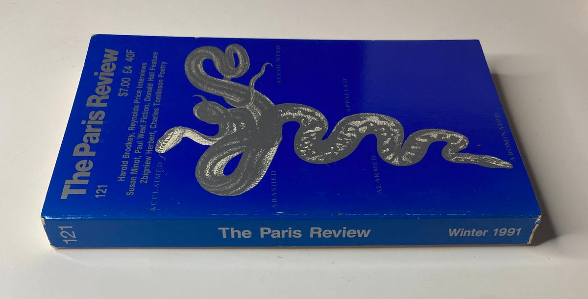 Spine view of The Paris Review Magazine Winter 1991 No. 121 showcasing its blue cover design and title.