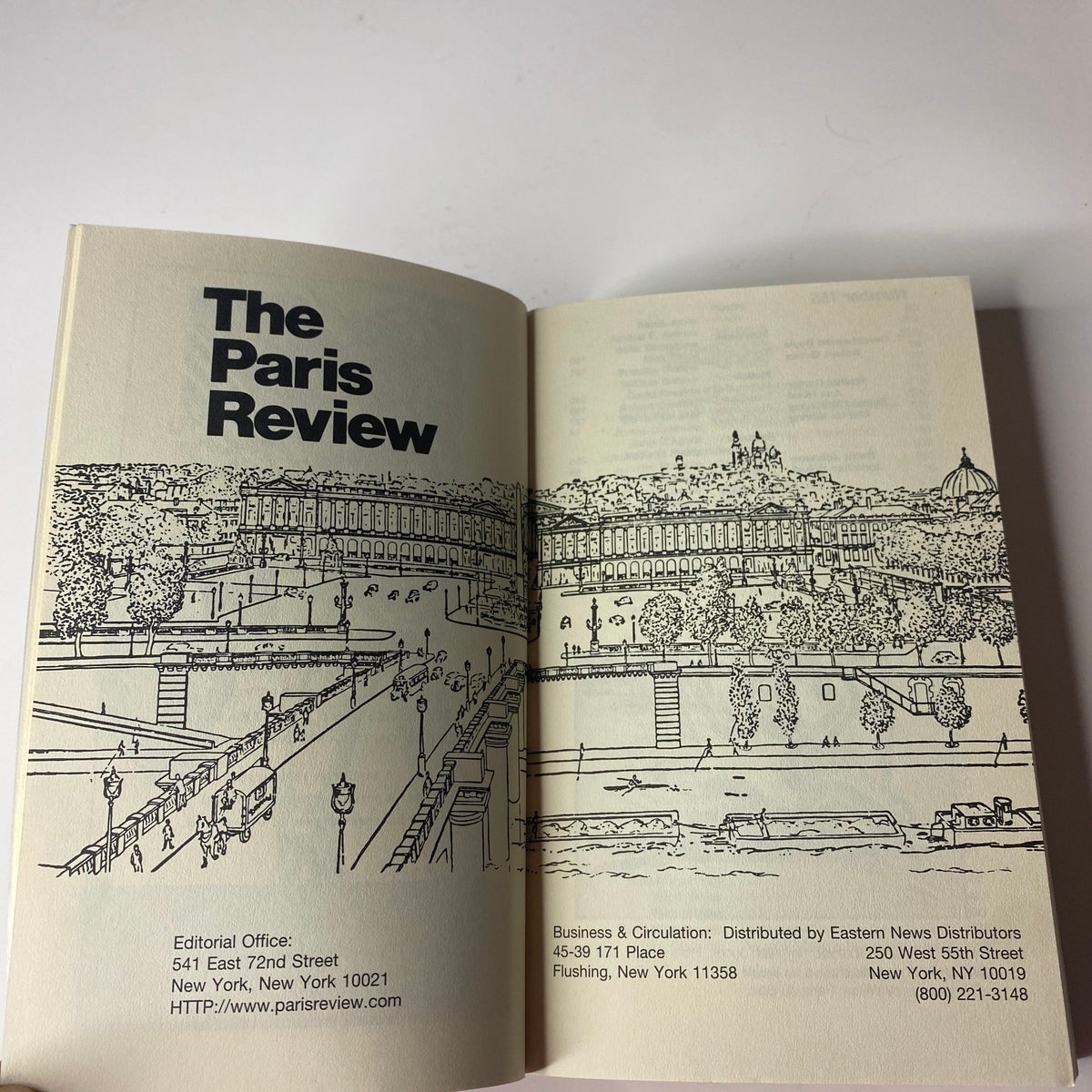 Inside view of The Paris Review Magazine, Summer 2000, No. 155 displaying an illustration of a landmark along the river.
